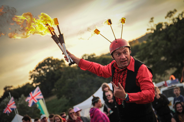 Fire juggler performer Thomas Trilby fire and glow show events entertainment